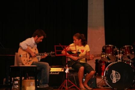 Sjusha Nikondrova guitar student accompanied by Daniel Babekhul guitar teacher
